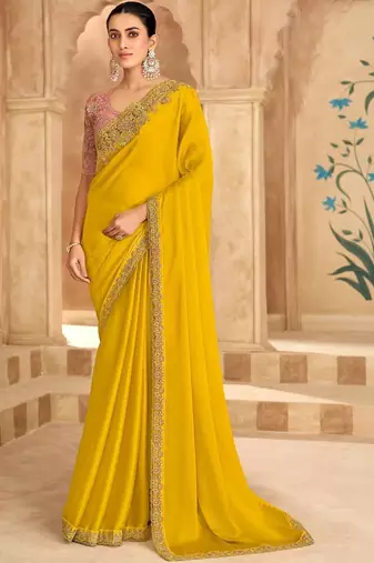 yellow embellished embroidered satin heavy work saree