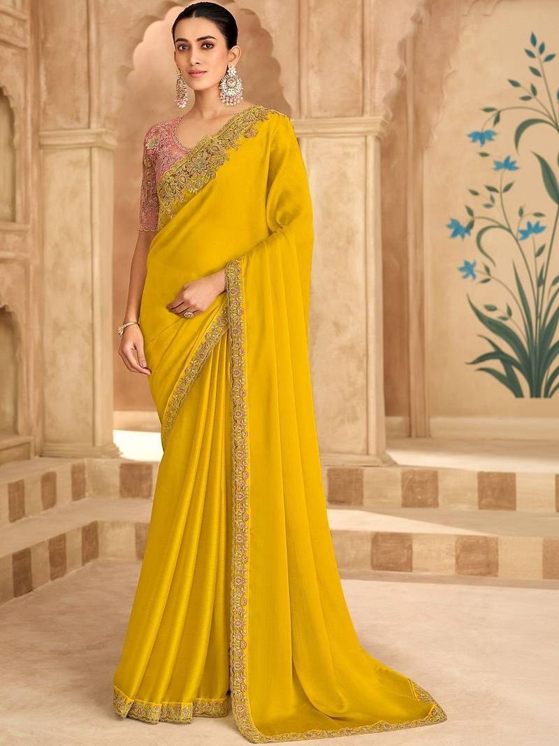 yellow embellished embroidered satin heavy work saree