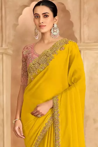 yellow embellished embroidered satin heavy work saree