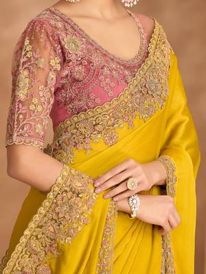 yellow embellished embroidered satin heavy work saree 4