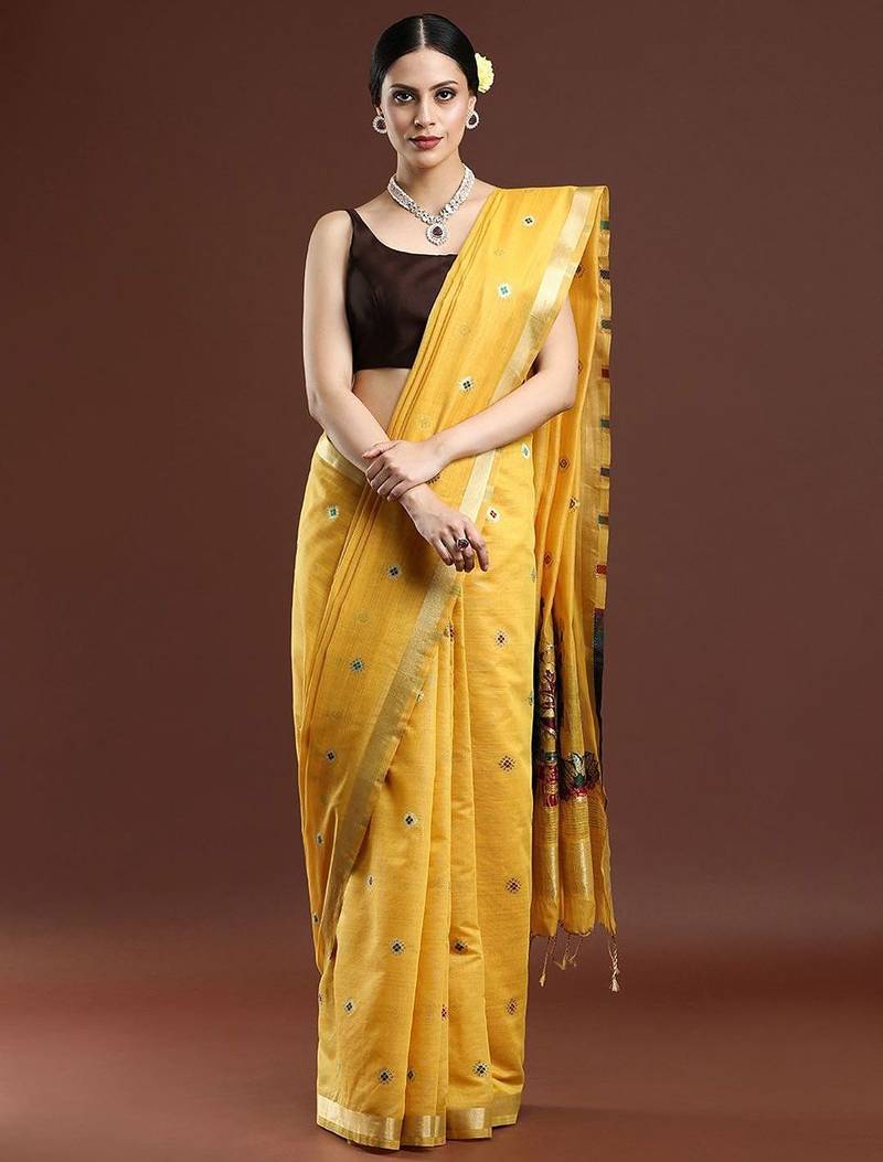 yellow floral woven design zari muga saree