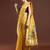 yellow floral woven design zari muga saree