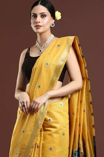 yellow floral woven design zari muga saree