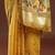 yellow floral woven design zari muga saree