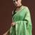green floral muga saree