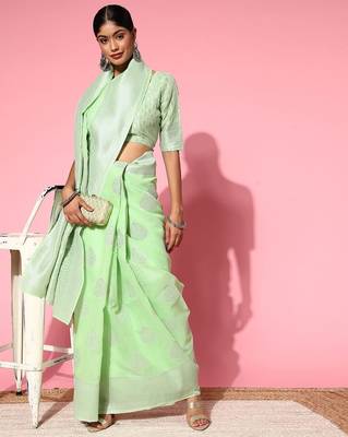green floral saree with woven design border 1