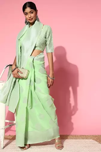 green floral saree with woven design border