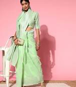 green floral saree with woven design border