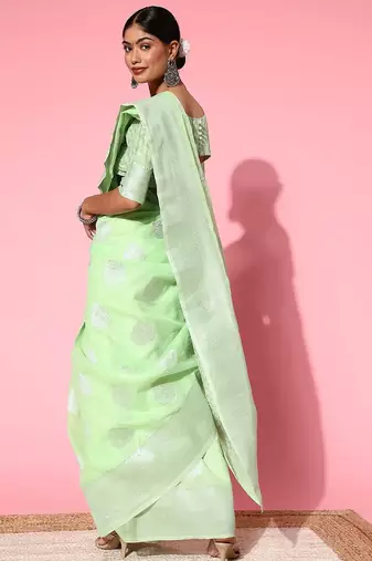 green floral saree with woven design border