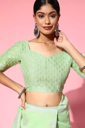 green floral saree with woven design border