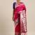 Coral coral & gold-toned ethnic motifs woven design zari saree
