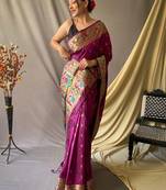 Pink woven design zari tissue saree with unstitched blouse piece