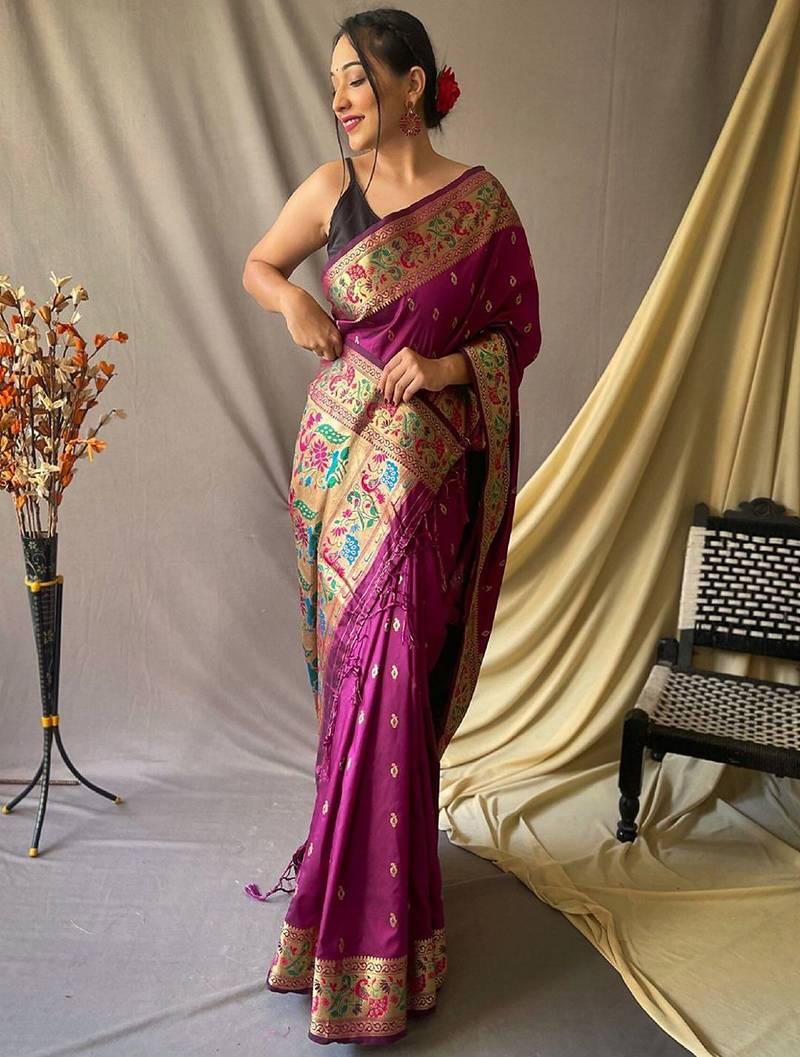 Pink woven design zari tissue saree with unstitched blouse piece