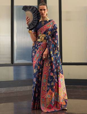Teal ethnic motif woven design tassel saree 1