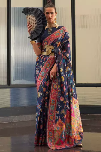 Teal ethnic motif woven design tassel saree