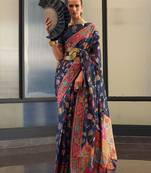 Teal ethnic motif woven design tassel saree