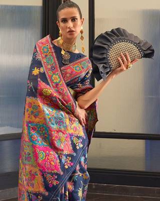 Teal ethnic motif woven design tassel saree 4