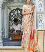 cream cream-coloured & red floral silk blend saree