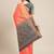 peach peach-coloured & navy blue ethnic motifs zari silk blend patola saree