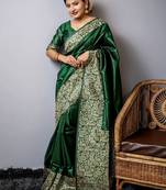 green ethnic motif woven design tassel saree