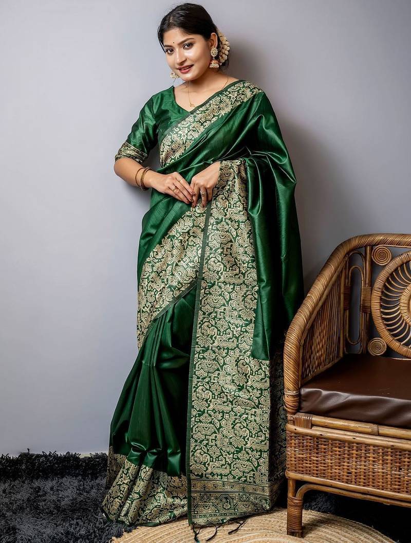 green ethnic motif woven design tassel saree