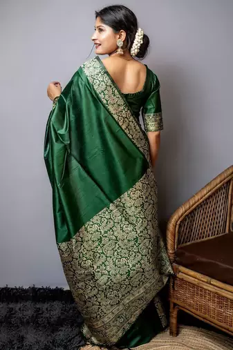 green ethnic motif woven design tassel saree