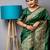 green ethnic motif woven design tassel saree