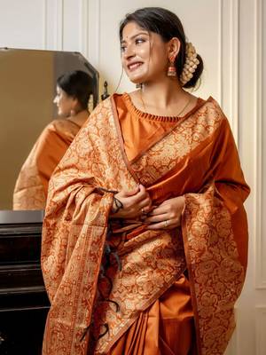 orange ethnic motif woven design tassel saree 3