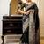 black woven design saree with blouse piece