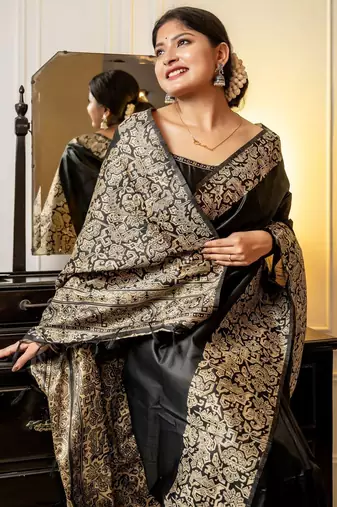 black woven design saree with blouse piece