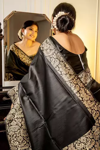 black woven design saree with blouse piece