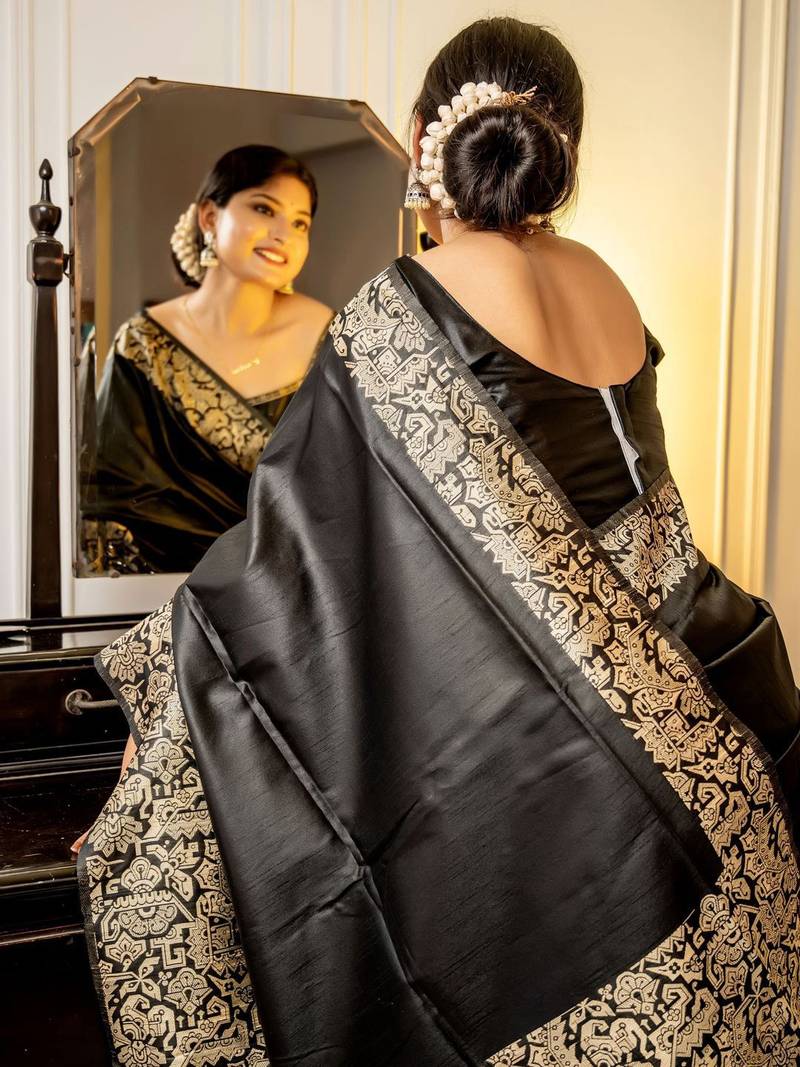 black woven design saree with blouse piece