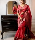 Pink woven design zari silk blend paithani saree with blouse piece