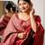 Pink woven design zari silk blend paithani saree with blouse piece