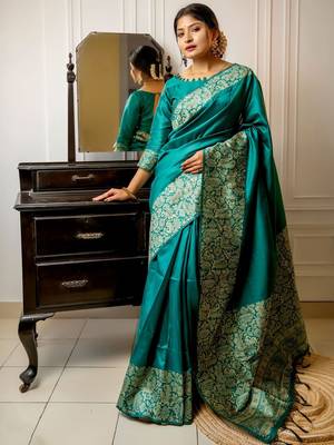 teal ethnic motif woven design tassel saree 1