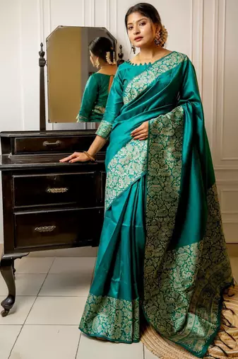 teal ethnic motif woven design tassel saree