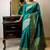 teal ethnic motif woven design tassel saree