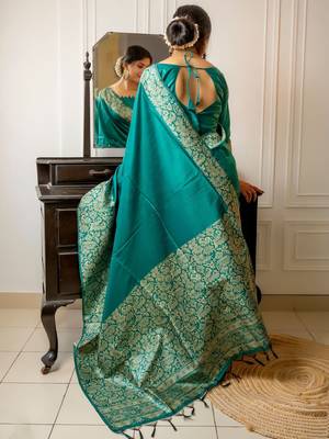 teal ethnic motif woven design tassel saree 2