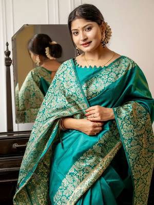 teal ethnic motif woven design tassel saree 3