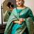 teal ethnic motif woven design tassel saree