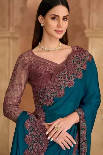 teal embellished embroidered satin heavy work saree
