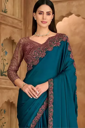 teal embellished embroidered satin heavy work saree