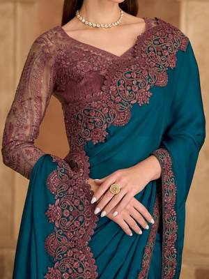 teal embellished embroidered satin heavy work saree 4