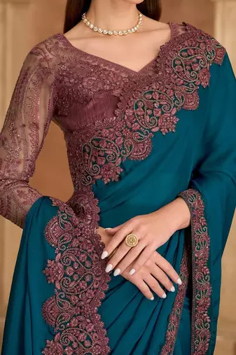 teal embellished embroidered satin heavy work saree
