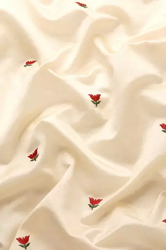 cream cream & pink floral embroidered assam silk cotton banarasi saree