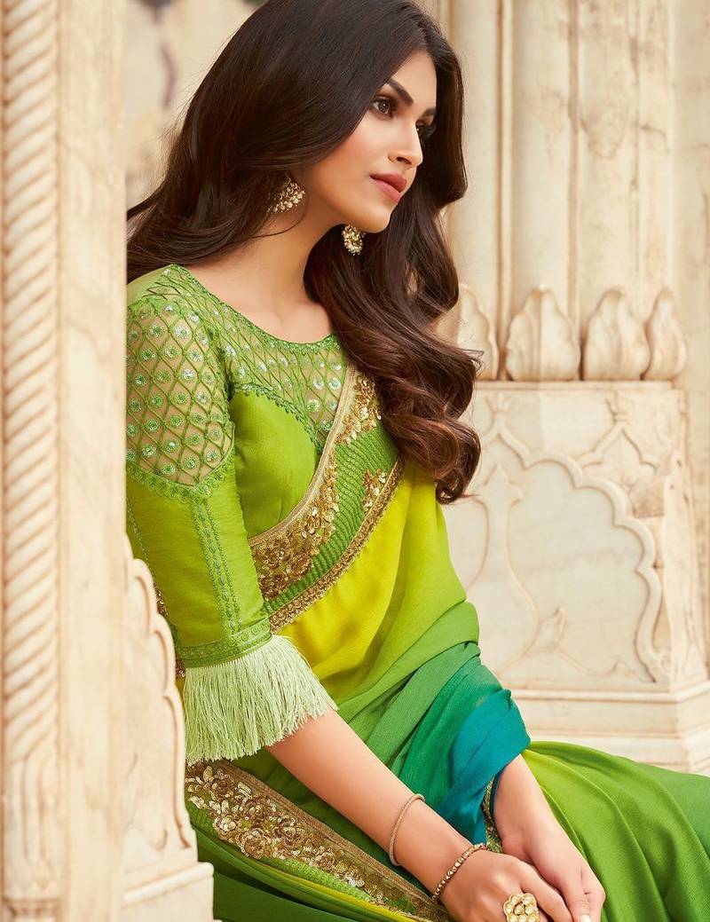 Green embroidered satin saree with unstitched blouse piece