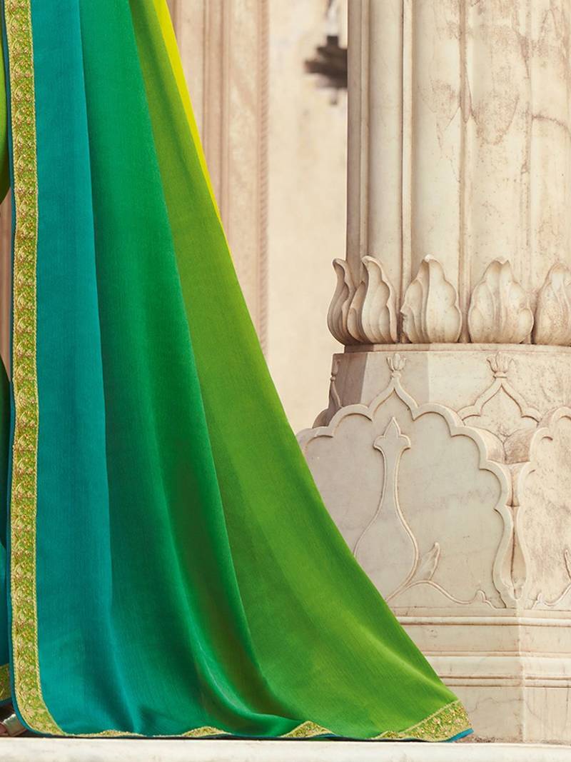 Green embroidered satin saree with unstitched blouse piece