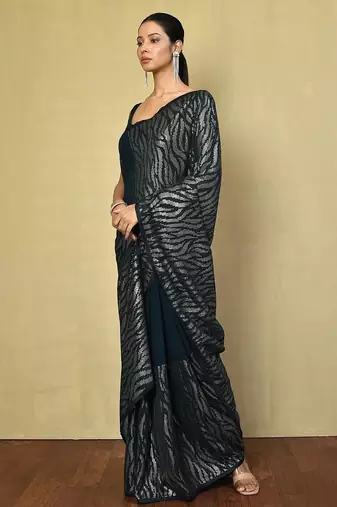 teal embellished sequinned poly georgette saree