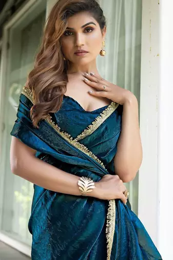 Blue blue & green printed poly georgette bandhani saree