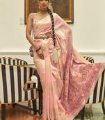 Sea green embellished embroidered net saree with unstitched blouse piece